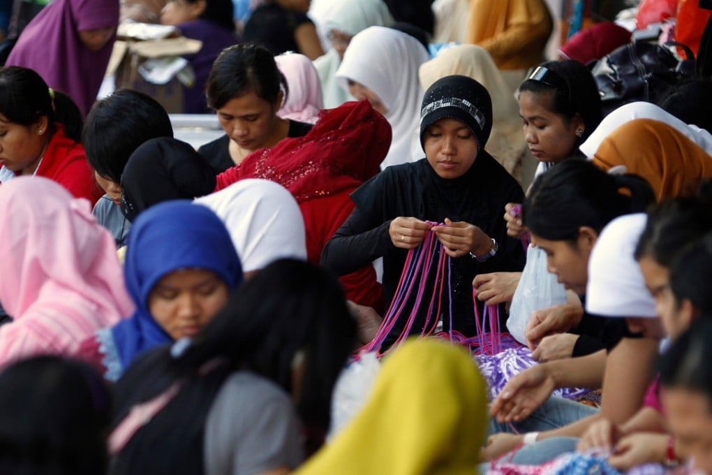According to Hong Kong government figures, there were an additional 3,834 Indonesian domestic helpers in 2016. Photo: AFP