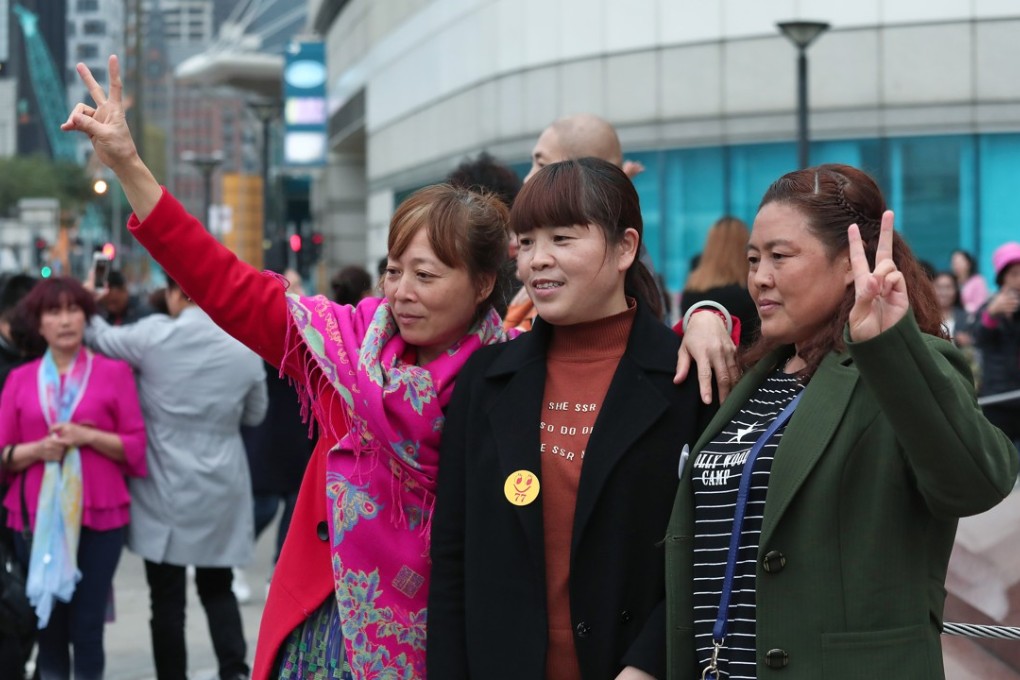 Visitors from the mainland, such as these women in Wan Chai, fuelled tourist numbers last month. Photo: Jonathan Wong
