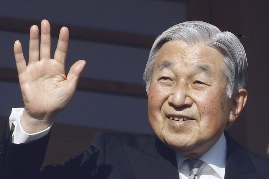 Japan’s Emperor Akihito waves to well-wishers from the palace balcony during a New Year’s public appearance with his family members at the Imperial Palace in Tokyo on January 2. Japan's Prime Minister Shinzo Abe says Akihito will abdicate on April 30, 2019. Photo: AP