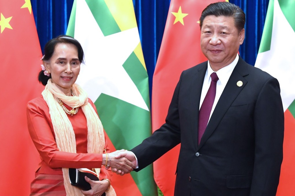 Aung San Suu Kyi meets Xi Jinping during an international conference in Beijing on Friday. Photo: Xinhua