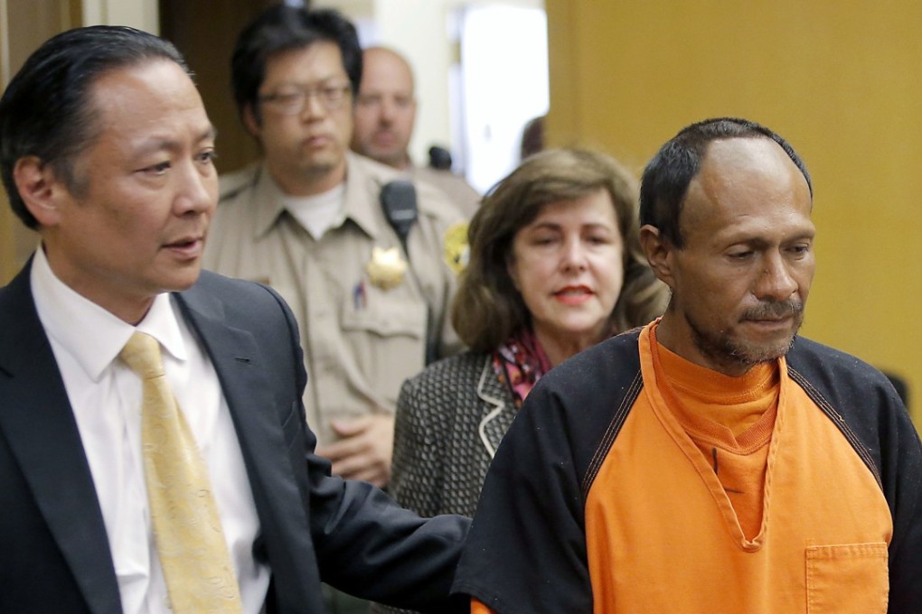 Jose Garcia Zarate, right, is led into the courtroom by San Francisco Public Defender Jeff Adachi, left, for his arraignment at the Hall of Justice in San Francisco on July 7, 2015. Photo: AP