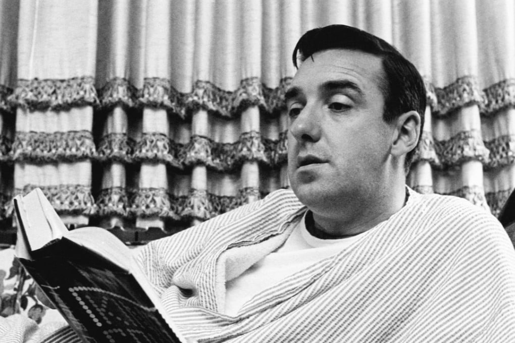 In this November 14, 1967 file photo, singer and actor Jim Nabors reads a book at his California home. Nabors died peacefully at his home in Honolulu on Thursday with his husband Stan Cadwallader at his side. Photo: AP