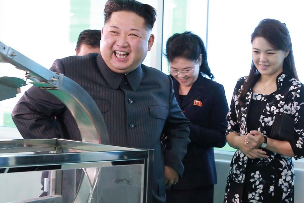 North Korean leader Kim Jong-un visits a cosmetics factory in Pyongyang with his wife Ri Sol-ju (right). Photo: AP