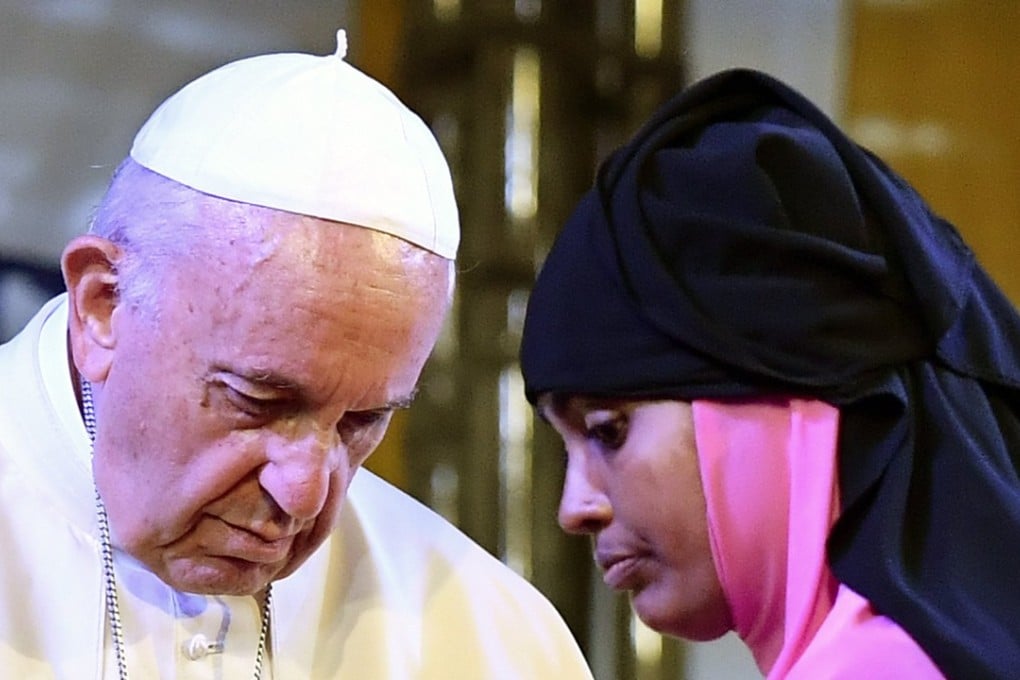 Pope Francis meets with Rohingya refugees in Bangladesh on Friday. Photo: EPA