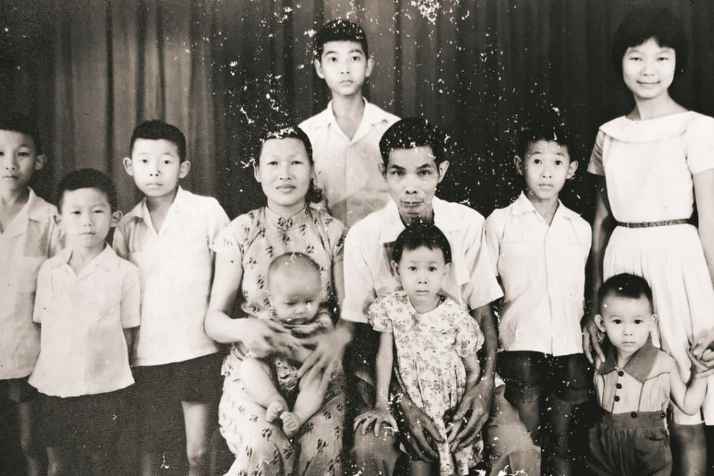 Wong Se Kong, since renamed Surya Widianto Wong, sits on his mother’s lap in this family photo from 1961. Photo: Stanley Widianto