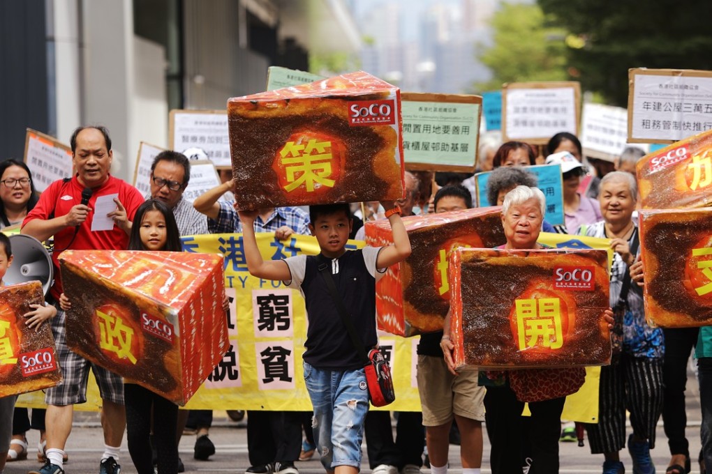 Members of the Society for Community Organisation march to the government headquarters to demand more poverty reduction measures in the Hong Kong chief executive’s policy address, on October 5. The 2017 policy address, delivered on October 11, pledged more resources for poverty alleviation and the disadvantaged. Photo: Sam Tsang
