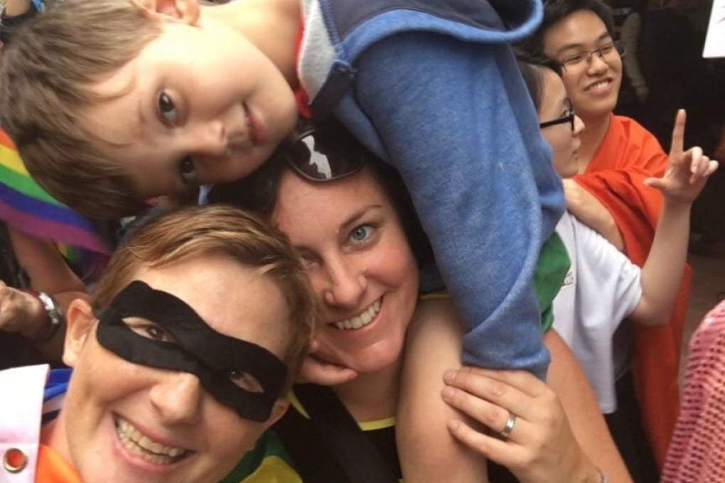 Same-sex parents talk about the pressures they face bringing up their children in a conservative society which focuses on their sexuality rather than the happy families they have created, and see city’s hosting of Gay Games as a positive