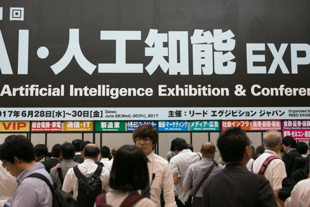 Visitors attend the Artificial Intelligence Exhibition and Conference in Tokyo in June 2017. There is a global AI talent pool of about 300,000 people, while the actual needs by industry number in the millions, according to a new report. Photo: EPA