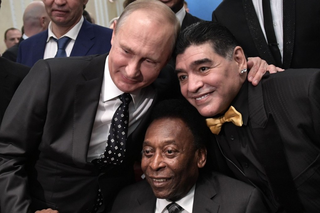 Russian President Vladimir Putin, Brazilian football legend Pele and Argentina's Diego Maradona pose for pictures ahead of the Final Draw for the 2018 Fifa World Cup football tournament at the State Kremlin Palace in Moscow on December 1, 2017. Photo: AFP