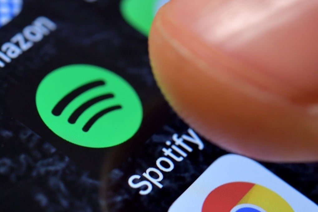 Tencent Music and Spotify are considering a share swap. Photo: EPA