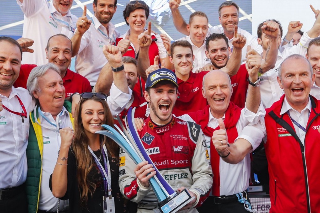 Germany’s Daniel Abt (centre) celebrates his HKT Hong Kong E-Prix win with his ABT Schaeffler Audi Sport team, before he was disqualified. Photo: Edward Wong