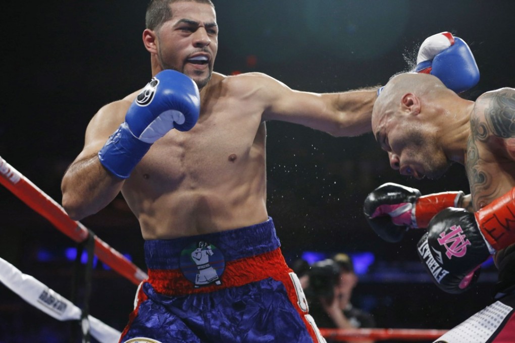 Sadam Ali (L) sent Miguel Cotto into retirement on the back of a 12-round decision loss. Photo: USA Today