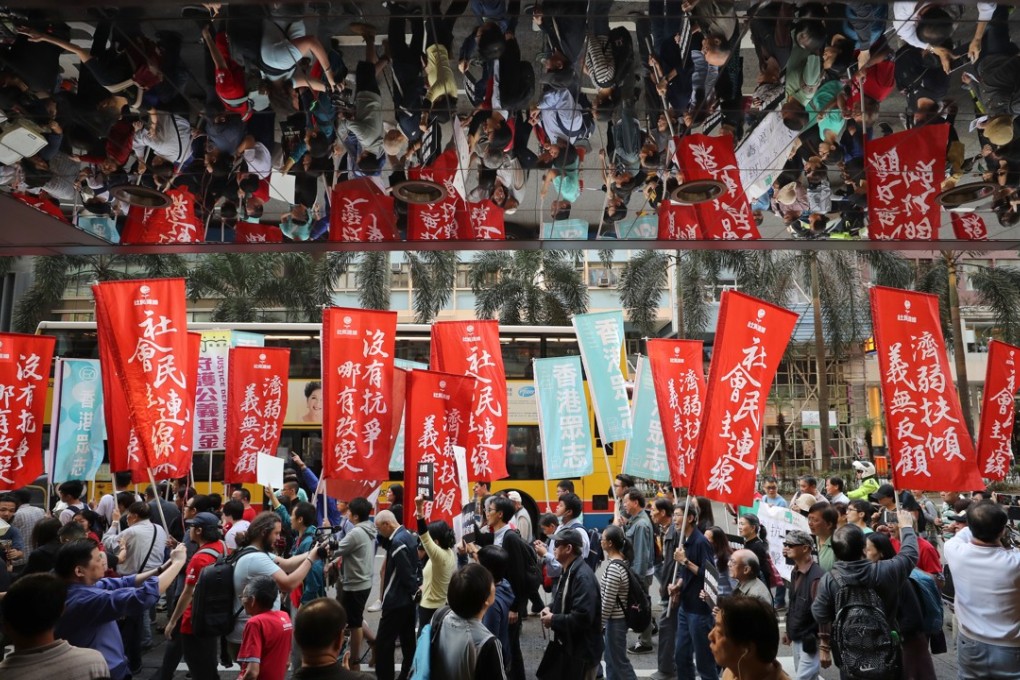 The government’s handling of lawmakers who altered their oaths and were ousted was a sore point for many protesters on Sunday. Photo: Winson Wong