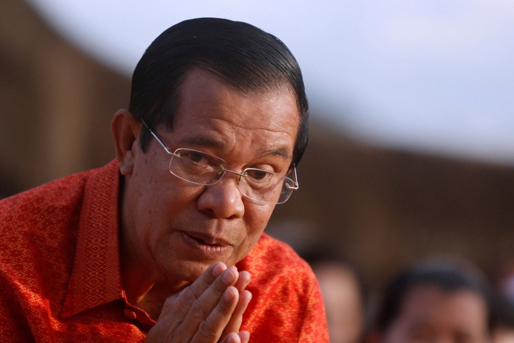 Cambodia's Prime Minister Hun Sen at the Angkor Wat temple to pray for peace and stability in Cambodia. Photo: Reuters