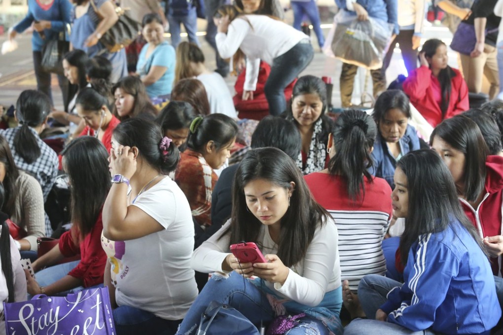 Filipino domestic helpers during a weekend gathering in Central. Photo: Dickson Lee