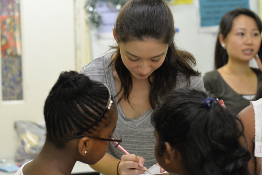 Pia Warburton has been helping refugee children with their homework every weekend through HandsOn Hong Kong. Photo: Handout