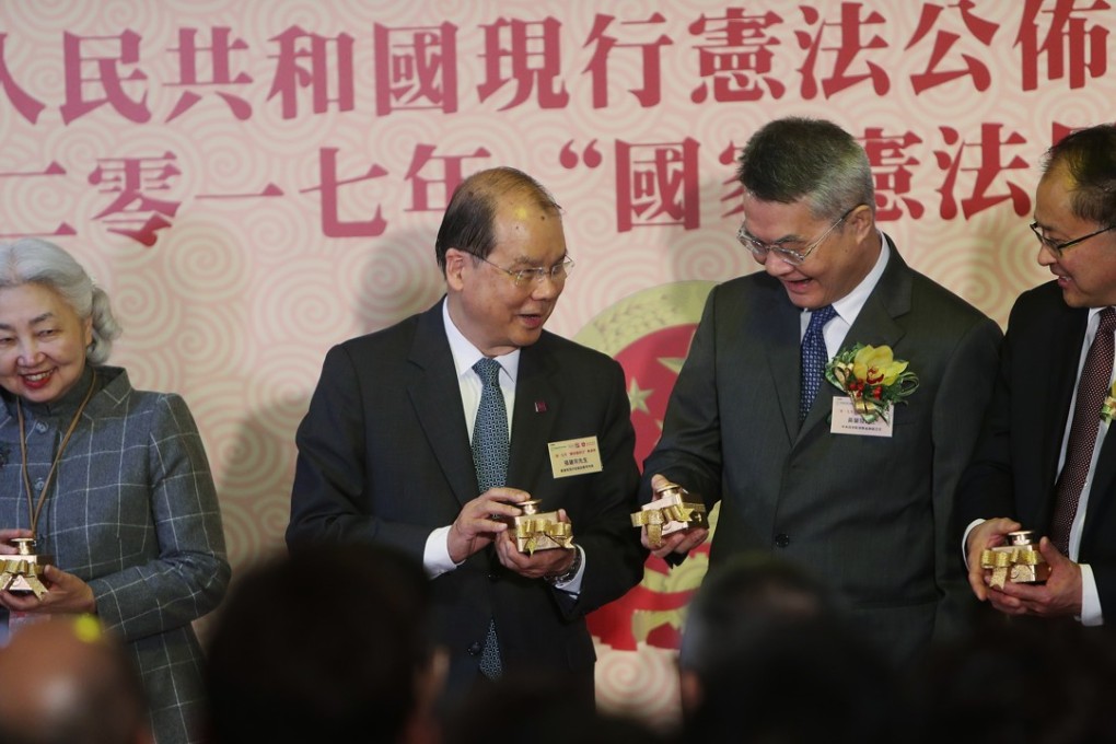 (Left to right) Deputy director of the Basic Law Committee Elsie Leung Oi-sie; Chief Secretary Matthew Cheung Kin-chung; deputy director of the Liaison Office Huang Lanfa and Deputy commissioner of the Office of the Commissioner of the Ministry of Foreign Affairs in Hong Kong Hu Jianzhong at the National Constitution Day Forum at the Grand Hyatt Hong Kong on Monday. Photo: Winson Wong