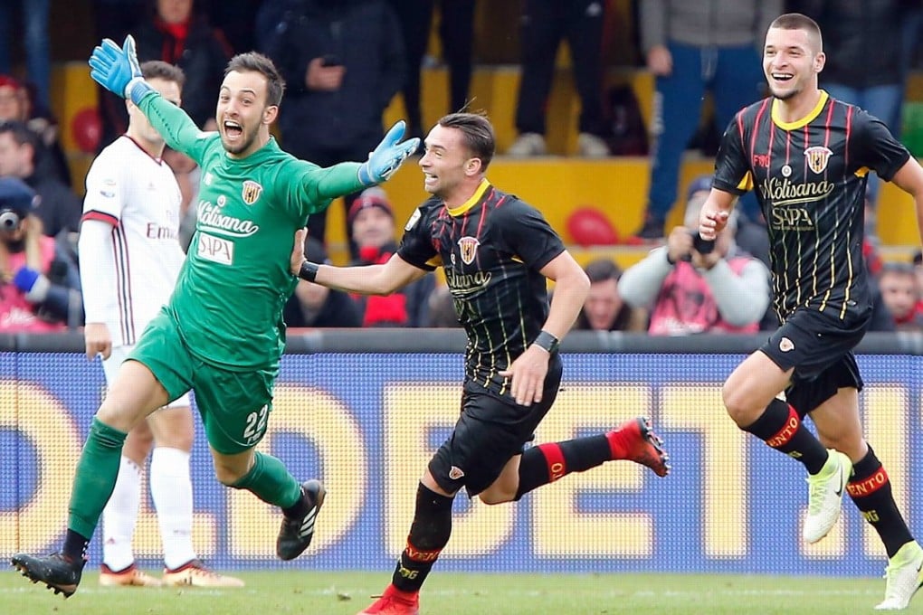 Benevento goalkeeper Alberto Brignoli (L) is jubilant after securing the first Serie A point in Benevento’s history. Photo: EPA