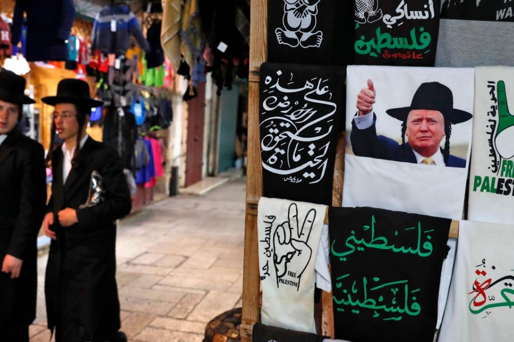 A T-shirt bearing an image of US President Donald Trump dressed as a Hasidic Jew. Photo: AFP