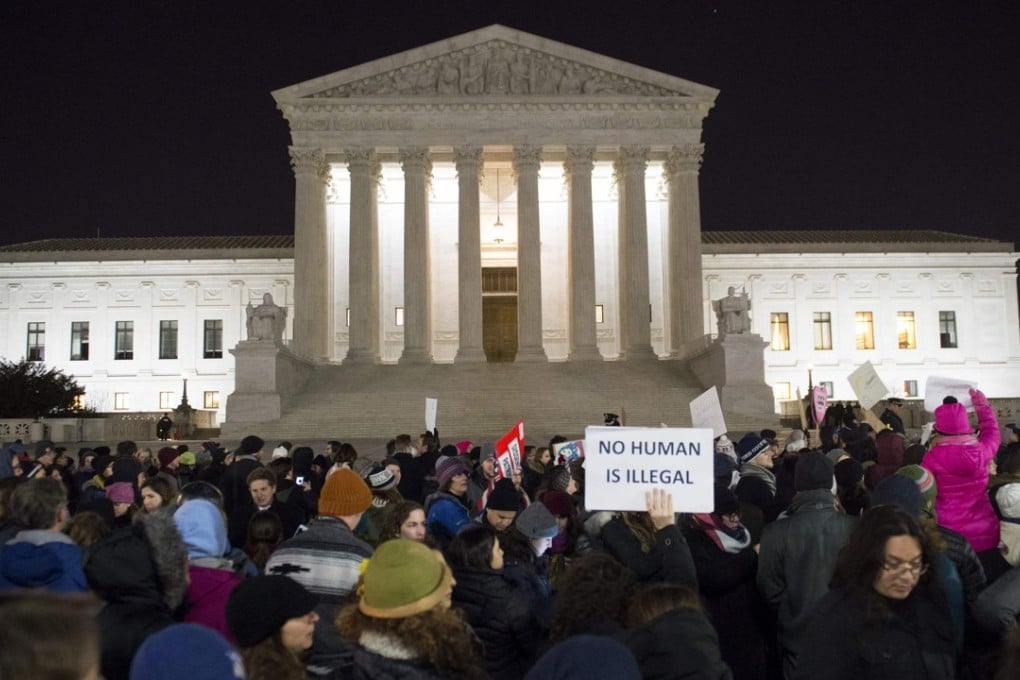 Protesters gather outside the US Supreme Court in Washington, calling for Trump’s travel ban to be scrapped. Photo: AFP