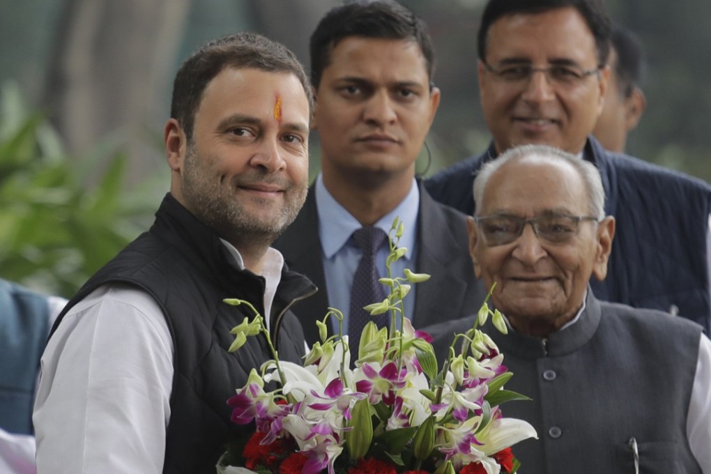 Senior Congress party leaders welcome their Rahul Gandhi, who has submitted his nomination to succeed his mother as the president of the opposition party. Photo: AP