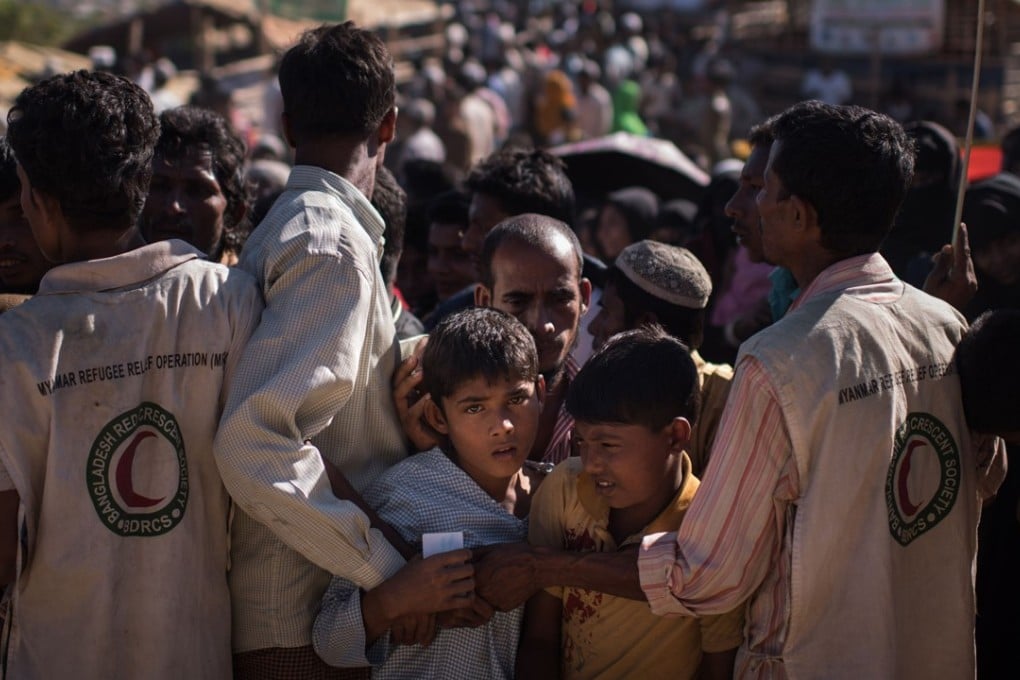 Rohingya Muslim refugees children queue for aid at the Kutupalong refugee camp in Cox’s Bazar. Photo: AFP