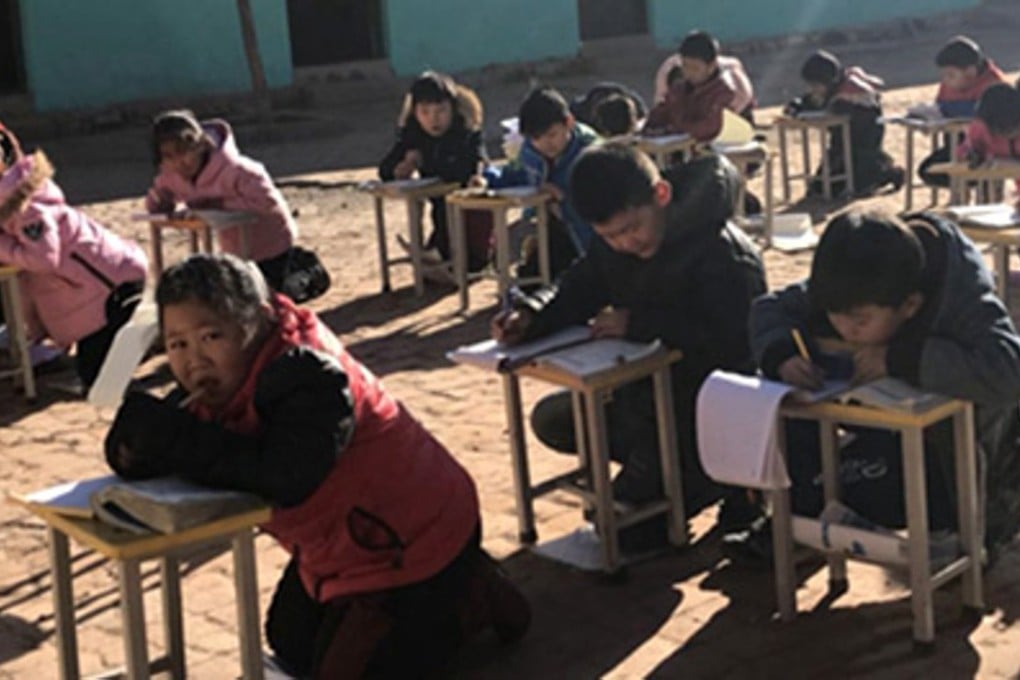 Schoolchildren attend alfresco classes in Hebei province in freezing weather. Photo: Thepaper.cn