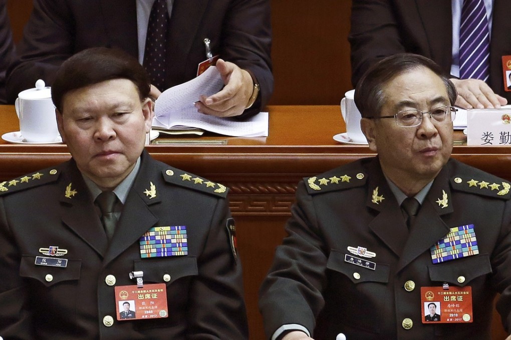 Zhang Yang, left, then the head of the People's Liberation Army Political Affairs Department, and Fang Fenghui, the then-chief of the general staff of the PLA, attend the National People's Congress at the Great Hall of the People in Beijing. Both Zhang and Feng have been felled by China’s anti-corruption probe, and Zhang killed himself on November 23. Photo: AP
