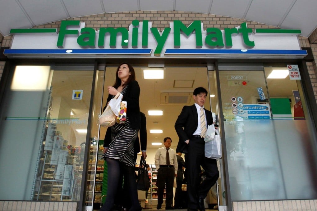 People walk out from a FamilyMart convenience store in Tokyo. Photo: REUTERS