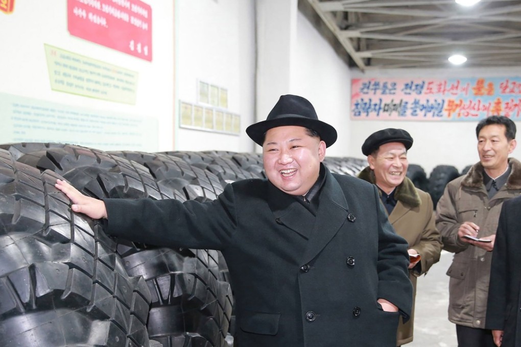North Korean leader Kim Jong-un visiting a tired factory this month. A senior UN official will visit the country this week. Photo: KCNA via AFP