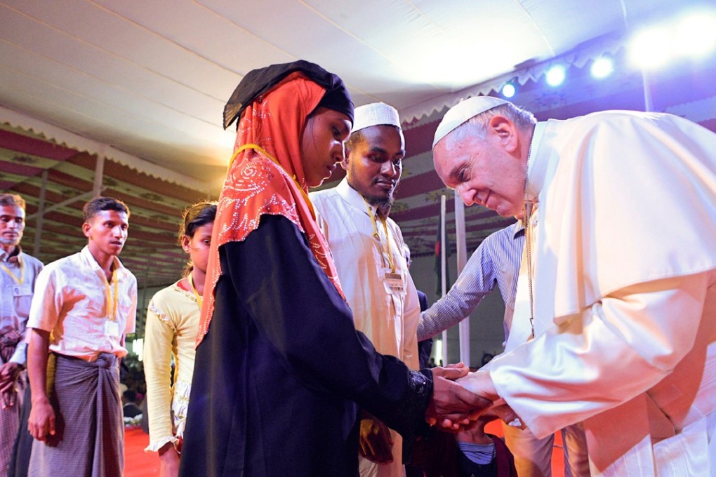 Pope Francis meets Rohingya refugees during an inter-religious conference at St Mary’s Cathedral in Dhaka, Bangladesh, on December 1. Photo: Reuters