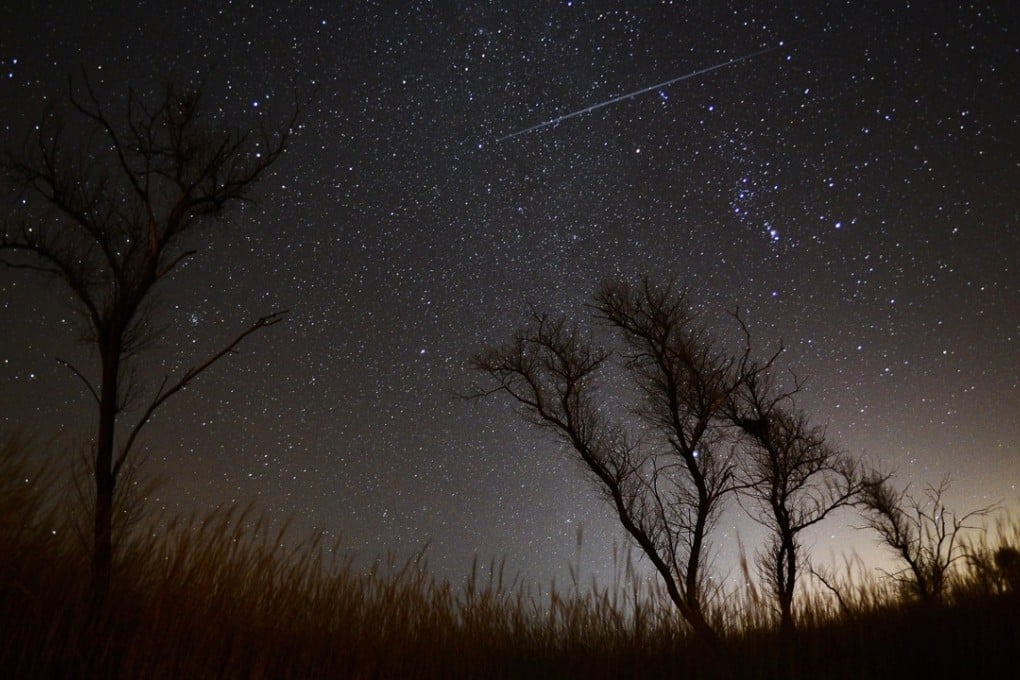 The night sky over the city of Vladivostok in Russia during the Geminid meteor shower in 2015. Photo: Alamy