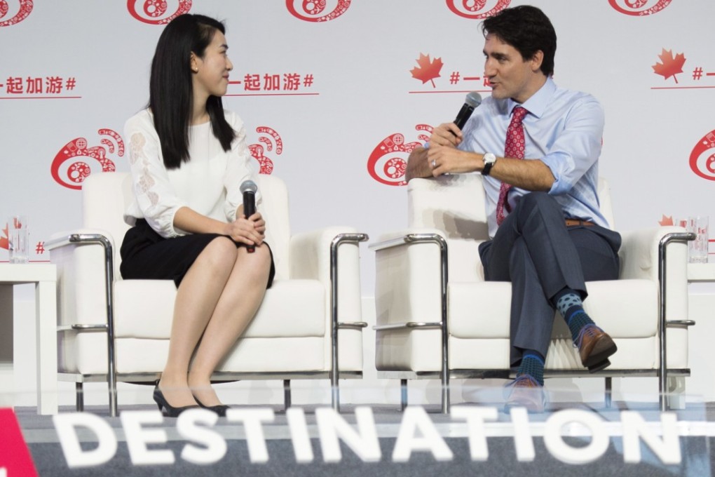 Canadian Prime Minister Justin Trudeau talks with Yani, a teacher and influencer on Chinese social media, at a Beijing event to promote Canada-China tourism on December 4, 2017. Canada has also become a major destination for technology investments by large Chinese hi-tech companies. Photo: AP
