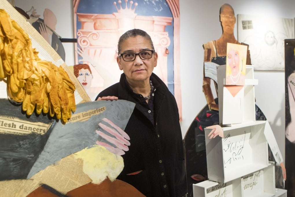 Winner of the 2017 Turner Prize Lubaina Himid poses with one of her works at the Ferens Art Gallery in Hull, Britain, on Tuesday. Photo: AP
