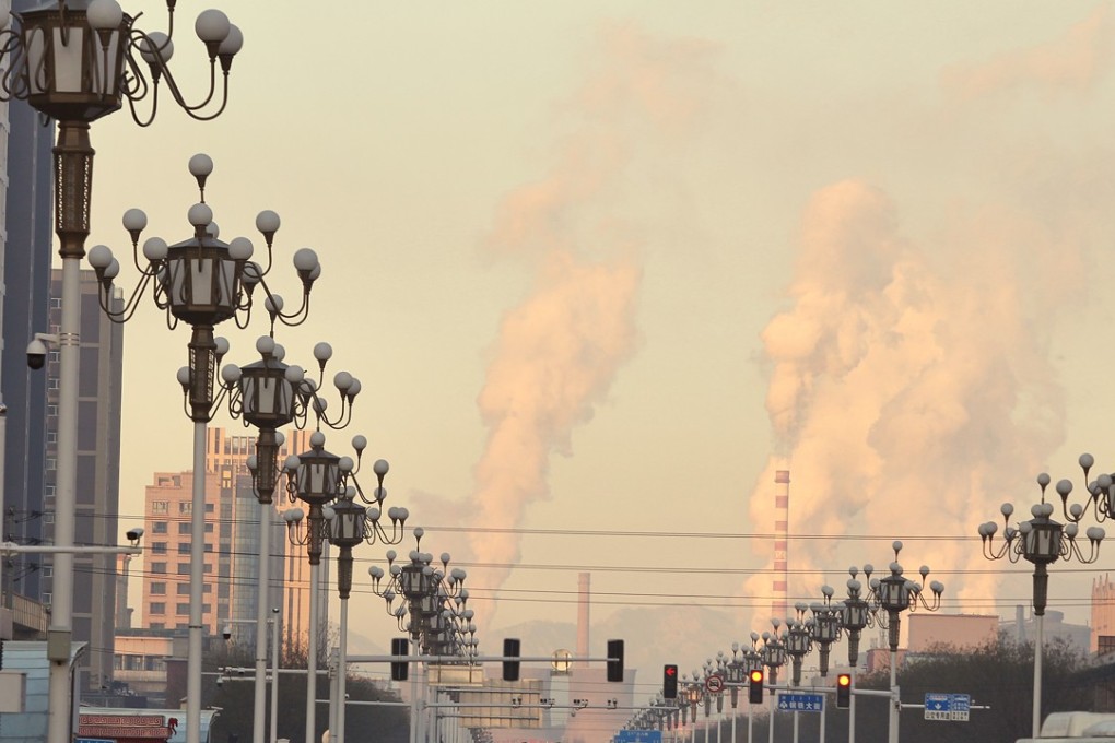 Smoke pours from industrial plants in Iron and Steel Street in Baotou in Inner Mongolia. Photo: Simon Song