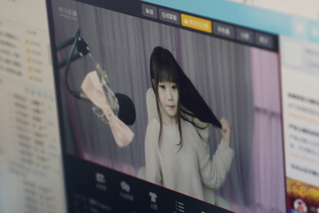 A girl broadcasts herself at Three Minute TV, a live streaming talent agency in Beijing. Nearly 400 million people in China regularly watch live broadcasts via mobile devices as a new form of entertainment. Photo: Reuters