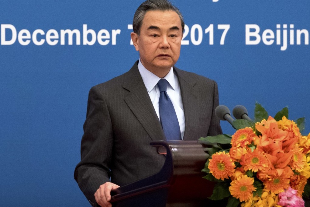 Chinese Foreign Minister Wang Yi addresses the opening session of the forum on Thursday. Photo: AP