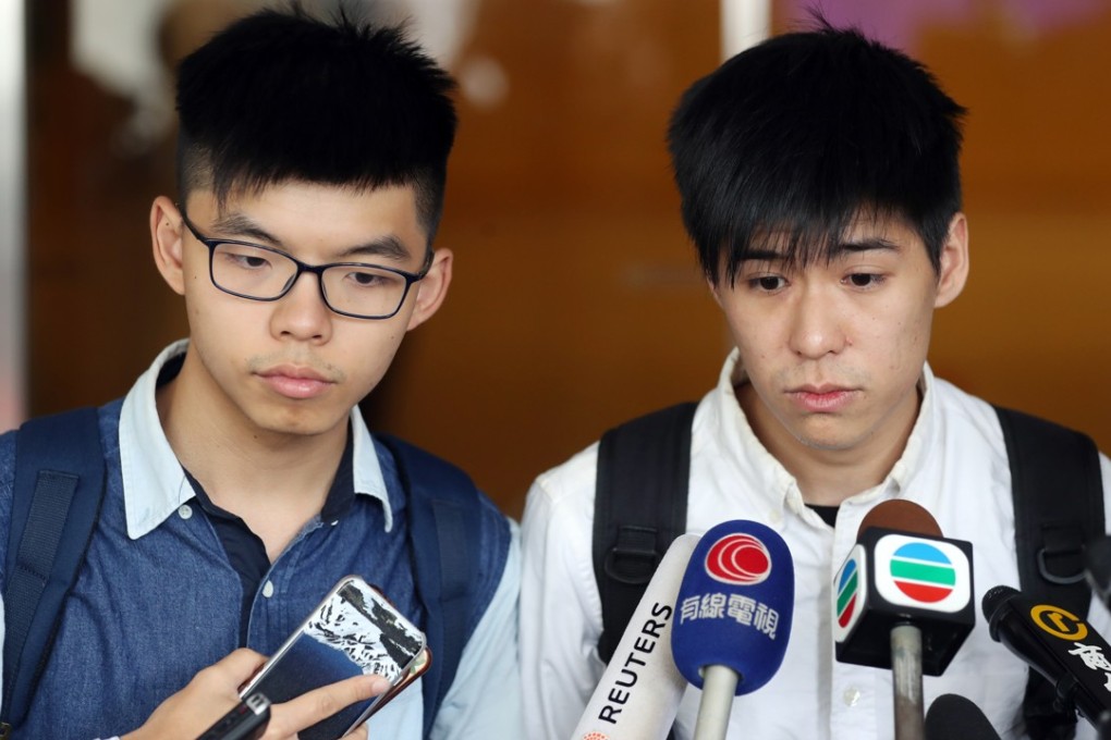 Activists Joshua Wong (left) and Lester Shum admitted to obstructing a court-ordered street clearance in Mong Kok during the 2014 Occupy protests. Photo: Edward Wong