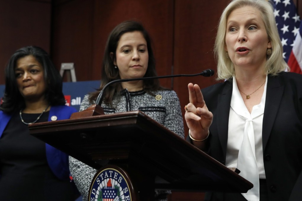 Senator Kirsten Gillibrand, right, answers a question about her statement on Senator Al Franken in a news conference on sexual harassment in the workplace. Photo: AP
