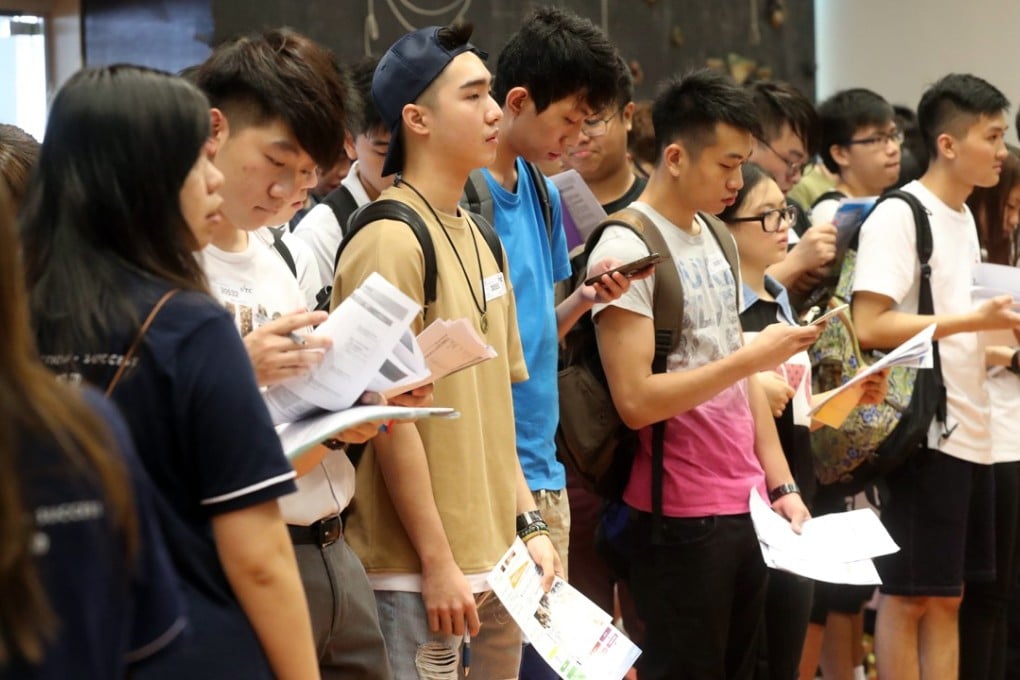 Students register for courses at the Vocational Training Centre's Institute for Vocational Education campus in Cheung Sha Wan. Photo: Edward Wong.