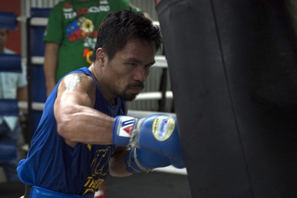 Philippine boxer Manny Pacquiao training at a gym in Manila. The boxer and senator is opening an academy in Beijing. Photo: AFP