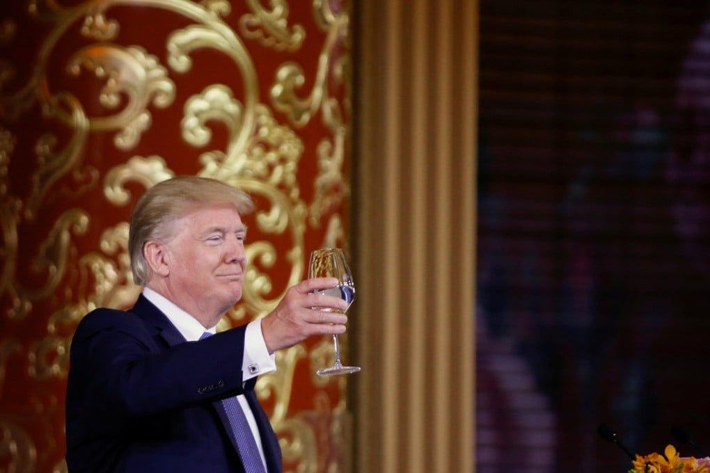 Donald Trump pictured at the state banquet in Beijing last month. While there he signed trade deals worth a total of US$ 253 billion. Photo: Reuters