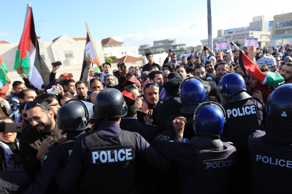 Protesters near the US Embassy in Amman, Jordan, demonstrate against US President Donald Trump's decision to recognise Jerusalem as the capital of Israel. Photo: Xinhua