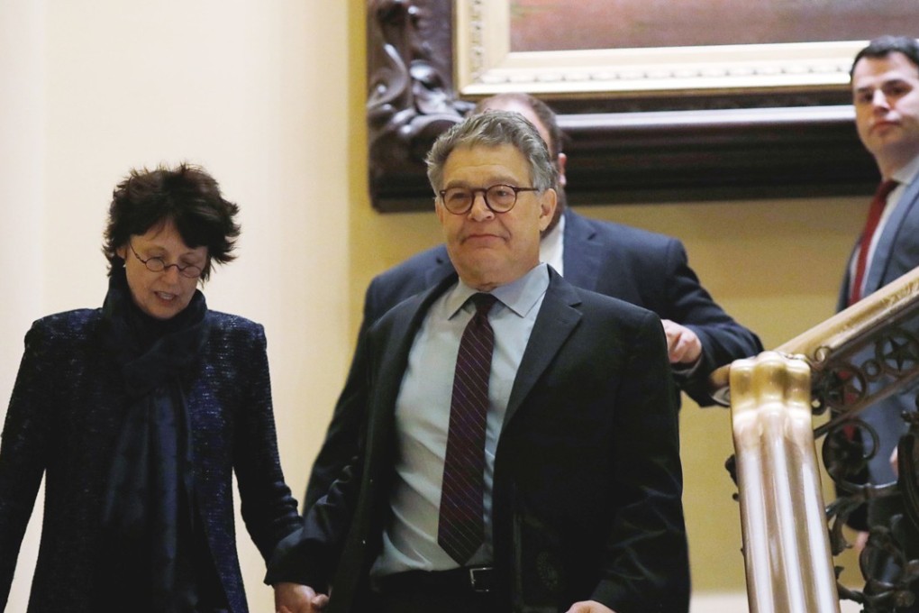 US Senator Al Franken departs the US Senate chamber with his wife Franni after announcing his resignation over allegations of sexual misconduct in Washington, on December 7, 2017. Photo: Reuters