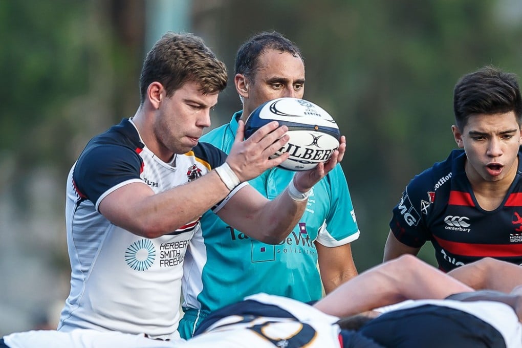 HKCC’s Jack Metters (left) prepares to feed a scrum. Photo: HKCC