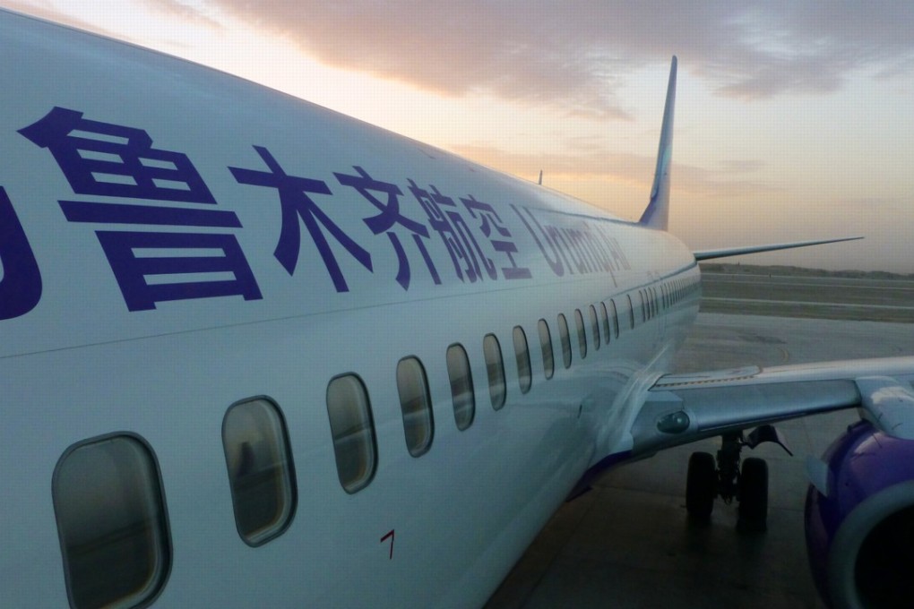 Urumqi Air now says the stewardess filmed the footage and posted it on social media.