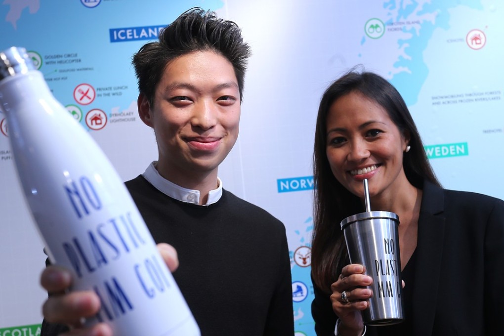 Philippe Li Kei-lap (left), business development manager of HK Recycles, and Patricia Dwyer, the founder of The Purpose Business, show their reusable drink containers at a discussion on creating a sustainable living environment in Hong Kong. Photo: Dickson Lee
