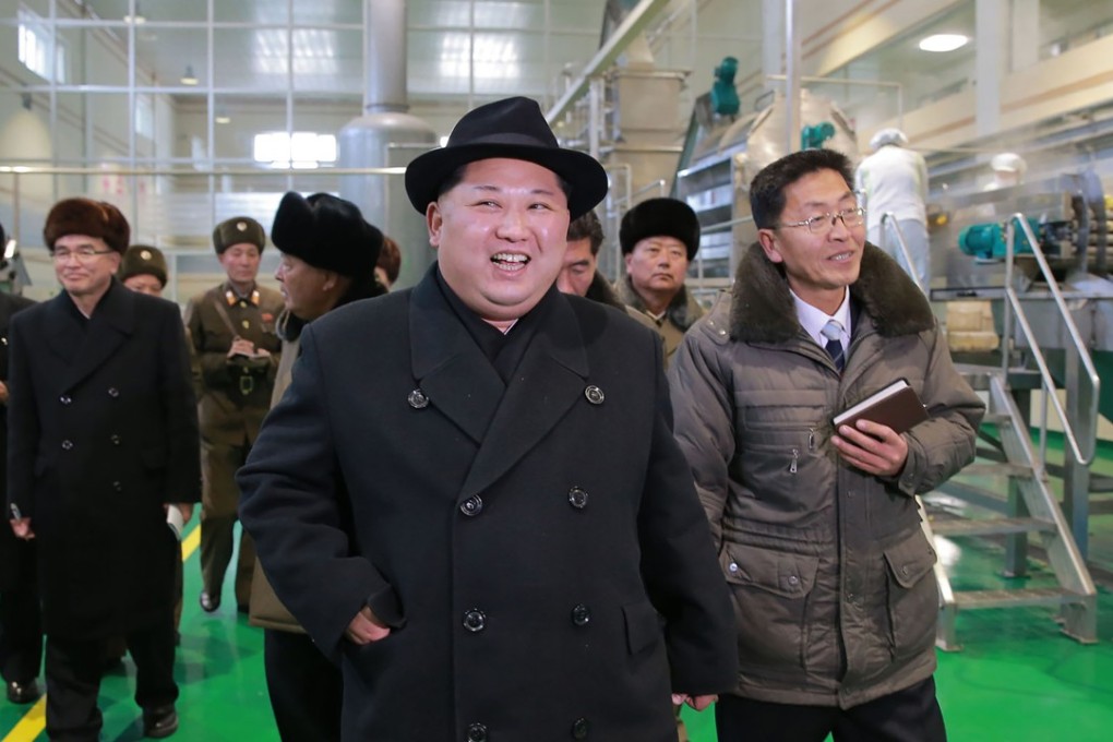North Korean leader Kim Jong-un (C) inspecting the newly-built Samjiyon potato farina production factory in Ryanggang Province, North Korea. Photo: KCNA via AFP