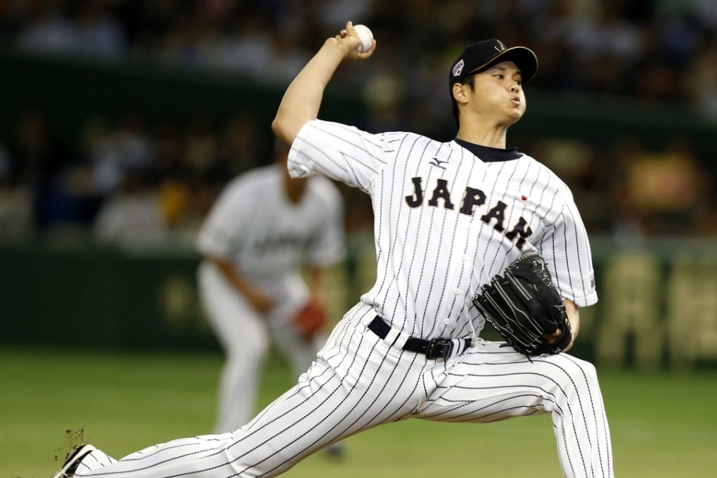 Japan's Shohei Otani pitches against South Korea during the first inning of their game at the Premier 12 world baseball tournament in Tokyo. Ohtani has signed with the Los Angeles Angels in the US. Photo: AP