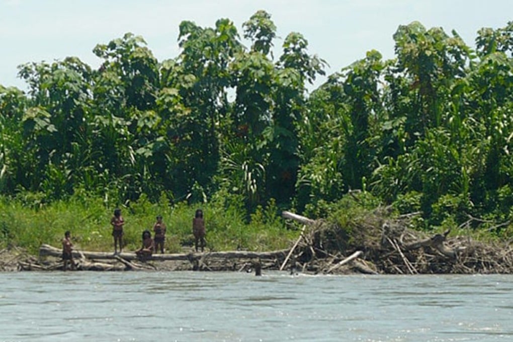 File photo of members of the Mashco Piro tribe on Madre de Dios river in Manu National Park, Peru. Photo: Jean-Paul Van Belle/The University of Cape Town